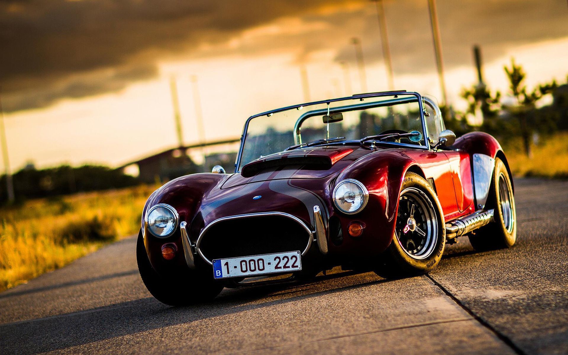 6213_Old-classic-car-small-AC-Cobra-on-the-road